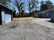 Backyard and Detached Garages on Single-Gathering Home at 4931 Happy Hollow Rd, Atlanta, GA 30360