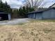 Multiple detached garages in backyard of a single-Gathering home at 4931 Happy Hollow Rd, Atlanta, GA 30360