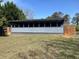 Sunroom on a single-Gathering home with backyard at 4931 Happy Hollow Rd, Atlanta, GA 30360