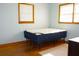 Simple bedroom featuring a new mattress, hardwood flooring, and ample natural light at 2234 Clifton Springs Mnr, Decatur, GA 30034