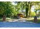 Quaint house with a long driveway and lush landscaping at 2234 Clifton Springs Mnr, Decatur, GA 30034