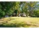 Picturesque home with large front yard and mature trees at 2234 Clifton Springs Mnr, Decatur, GA 30034