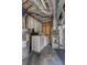 Basement utility area featuring a washer, dryer, furnace, and water heater, offering practicality and convenience at 32 Hillcrest Drive Southeast Se Dr, Austell, GA 30168