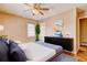 Comfortable bedroom with hardwood floors, mirror and dresser at 32 Hillcrest Drive Southeast Se Dr, Austell, GA 30168