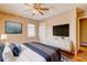 Bedroom with hardwood floors and blue accents, creating a soothing retreat at 32 Hillcrest Drive Southeast Se Dr, Austell, GA 30168