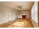 Bright living room with hardwood floors, a fireplace, and large windows offering plenty of natural light at 32 Hillcrest Drive Southeast Se Dr, Austell, GA 30168