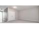 Spacious bedroom featuring neutral walls, plush carpet, a closet, and natural light at 801 Tulip Poplar Way # 2501, Lawrenceville, GA 30044