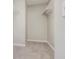 Carpeted walk-in closet featuring wire shelving to maximize storage and organization at 801 Tulip Poplar Way # 2501, Lawrenceville, GA 30044