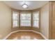 Cozy breakfast nook featuring bay windows and hardwood floors at 805 River Valley Dr, Dacula, GA 30019