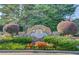 Stone community sign for The Terraces at Apalachee Farms with manicured landscaping at 805 River Valley Dr, Dacula, GA 30019