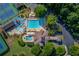 Aerial view of community clubhouse with a large pool and ' waterpark at 805 River Valley Dr, Dacula, GA 30019
