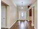 Bright entryway boasts high ceilings and hardwood floors, enhanced by decorative columns and trim at 805 River Valley Dr, Dacula, GA 30019