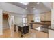 Stylish kitchen with granite countertops, center island, and modern lighting at 805 River Valley Dr, Dacula, GA 30019