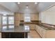 Well-designed kitchen featuring granite countertops, and ample cabinet space at 805 River Valley Dr, Dacula, GA 30019