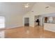 Open-concept living room featuring wood floors and natural light at 805 River Valley Dr, Dacula, GA 30019