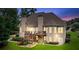 Backyard featuring a large deck, stairs, and ample green space, perfect for outdoor gatherings at 106 April Walk, Mcdonough, GA 30253