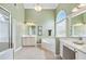 Luxurious bathroom featuring double vanities, soaking tub, and glass-enclosed shower at 106 April Walk, Mcdonough, GA 30253