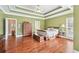 Spacious primary bedroom featuring hardwood floors, and large windows at 106 April Walk, Mcdonough, GA 30253