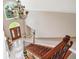 Elegant foyer with chandelier, staircase, and arched window for natural light at 106 April Walk, Mcdonough, GA 30253