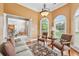 Cozy living room featuring ample natural light and comfortable seating arrangements at 106 April Walk, Mcdonough, GA 30253