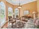 Inviting living room with a patterned rug, comfortable seating, and natural light at 106 April Walk, Mcdonough, GA 30253