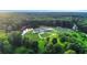 Estate with a pond, large home, gardens, and workshops, surrounded by a forest at 1169 Hodges Cir, Mansfield, GA 30055