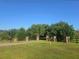 Stone pillars and wooden fence lining the private driveway at 1169 Hodges Cir, Mansfield, GA 30055