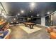 Large entertainment room boasts a custom bar, pool table, and chairs for a great time at 1169 Hodges Cir, Mansfield, GA 30055