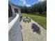 Patio area overlooking a green space with patio furniture at 1169 Hodges Cir, Mansfield, GA 30055