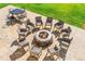 Outdoor patio with a fire pit, seating area, and table at 1169 Hodges Cir, Mansfield, GA 30055