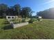 Expansive yard featuring a garden, shed and workshop provides ample space at 1169 Hodges Cir, Mansfield, GA 30055