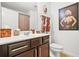 Bathroom with decorative accents, sleek vanity, and an enclosed shower at 3246 Spicy Cedar Ln, Lithonia, GA 30038