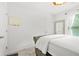 Inviting bedroom features a comfortable bed and soft natural light at 3246 Spicy Cedar Ln, Lithonia, GA 30038