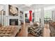 Bright living room with fireplace, hardwood floors, and an open layout, perfect for entertaining at 3246 Spicy Cedar Ln, Lithonia, GA 30038