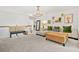 Bright living room features neutral colors and decorative wall art at 3246 Spicy Cedar Ln, Lithonia, GA 30038