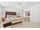 Bright and inviting main bedroom featuring a beautiful bed and stylish furnishings at 3246 Spicy Cedar Ln, Lithonia, GA 30038