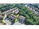 Beautiful aerial view showcasing the neighborhood's mature trees, manicured lawns, and sidewalks at 5965 Vista Brook Dr, Suwanee, GA 30024