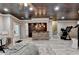 Basement with a wet bar, natural light, and a home gym, perfect for relaxation and recreation at 5965 Vista Brook Dr, Suwanee, GA 30024