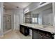 Bathroom with a large mirror, double sinks, a shower, and a tub at 5965 Vista Brook Dr, Suwanee, GA 30024