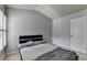 Well-lit bedroom boasts a vaulted ceiling and modern design at 5965 Vista Brook Dr, Suwanee, GA 30024