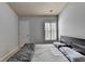 Comfortable bedroom with a bed and neutral color scheme at 5965 Vista Brook Dr, Suwanee, GA 30024
