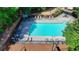An aerial view of the community pool with lounge chairs and a picnic area at 5965 Vista Brook Dr, Suwanee, GA 30024