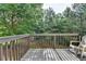 Wooden deck with a view of a yard with many trees at 5965 Vista Brook Dr, Suwanee, GA 30024