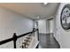 Second-floor hallway featuring beautiful dark hardwood flooring and neutral paint at 5965 Vista Brook Dr, Suwanee, GA 30024