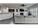 Inviting living room featuring a fireplace, ceiling fan, and modern decor at 5965 Vista Brook Dr, Suwanee, GA 30024