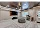 Finished basement with wood ceiling, entertainment area, and office space at 5965 Vista Brook Dr, Suwanee, GA 30024