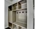 Functional mudroom with custom built-in shelving, hooks, and ample storage at 5965 Vista Brook Dr, Suwanee, GA 30024