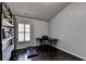 Home office with a window and modern desk setup at 5965 Vista Brook Dr, Suwanee, GA 30024