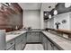Basement wet bar featuring custom cabinets, granite countertops, and ample storage space at 5965 Vista Brook Dr, Suwanee, GA 30024