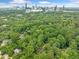 Secluded home with a view of the skyline of Charlotte NC, nestled within a lush forest setting at 1103 Lee Ne Cir, Atlanta, GA 30324
